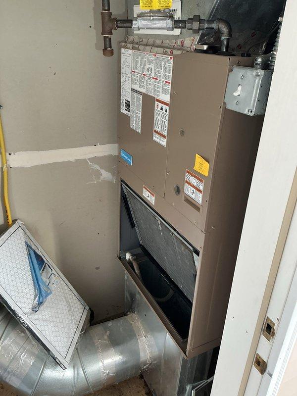 Responded to service call for AC unit leaking water and emitting foul odor. Diagnosed clogged condensate drain line caused by restricted airflow from overly restrictive air filter. Vacuumed and cleared drain line to restore proper drainage. Inspected evaporator coil and drain pan, noting accumulated debris consistent with reduced airflow conditions. Recommended replacement with MERV 3-5 rated filter to prevent future drain line blockages and maintain adequate system airflow. Unit tested and operating properly upon departure.