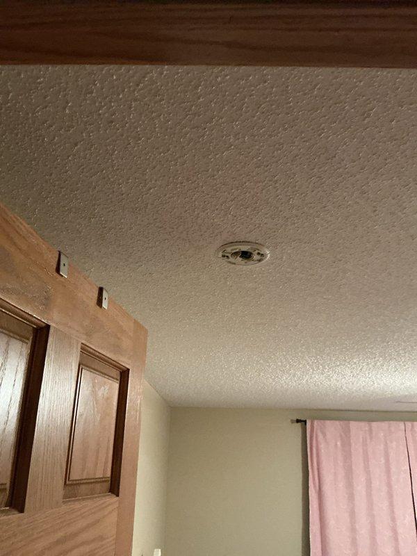 Completed FRM electrical inspection of residential property. Assessed existing ceiling-mounted LED light fixture, smoke alarm system, and electrical outlets throughout the home. Provided estimates for installation of dedicated washer outlet, smoke alarm replacement, and removal of existing light fixture. Documented current conditions of electrical components and fixtures with photographs for customer reference.