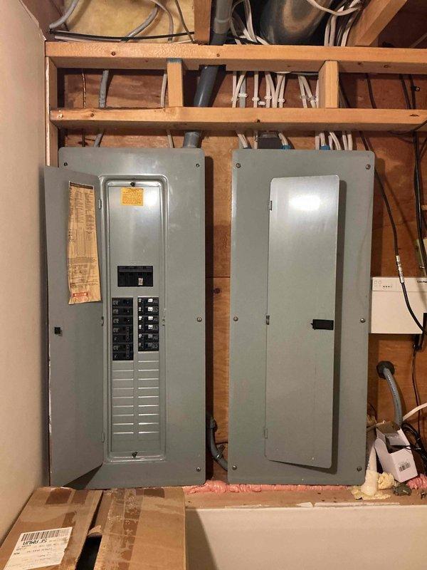 Arrived on-site to assess electrical requirements for installing two electric vehicle chargers. Conducted thorough evaluation of existing electrical infrastructure, including the off-peak panel location and available capacity. Determined that dedicated circuits and conduit installation would be necessary to route power from the off-peak panel to the proposed EV charger locations. Documented existing panel configuration and attic/ceiling space conditions where electrical runs would be required. Provided detailed estimates for running conduit and installing new circuits to support the EV charging stations.