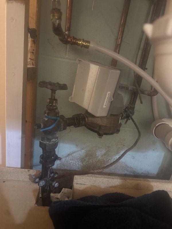 Responded to a water leak at the main shut off valve. Upon inspection, identified the leak was caused by loose packing around the valve stem rather than a faulty O-ring. Tightened the packing nut to compress the packing material and create a proper seal, which successfully stopped the leak. No parts replacement was necessary.