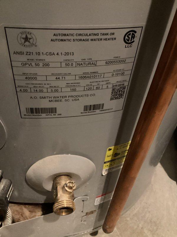 Arrived on-site and assessed existing A.O. Smith 50-gallon natural gas power vent water heater installation. Documented current equipment specifications, connections, and utility room configuration including copper supply piping, brass fittings, yellow-tagged valve assembly, and power vent motor mounted on top of unit. Prepared comprehensive estimate for replacement of 50-gallon natural gas power vent water heater with comparable equipment and necessary connections.