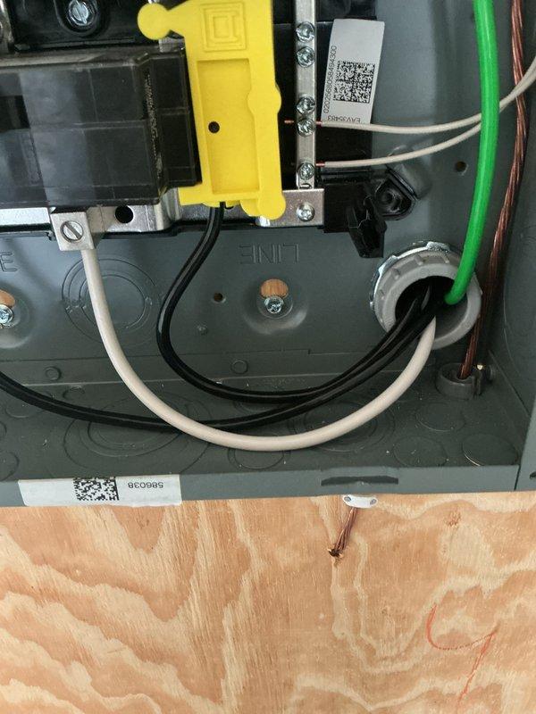 Responded to inspection correction requiring continuous white grounded conductor for number 6 wire in electrical panel. Pulled and installed new continuous white grounded wire to meet code requirements, replacing previous non-compliant wiring configuration.