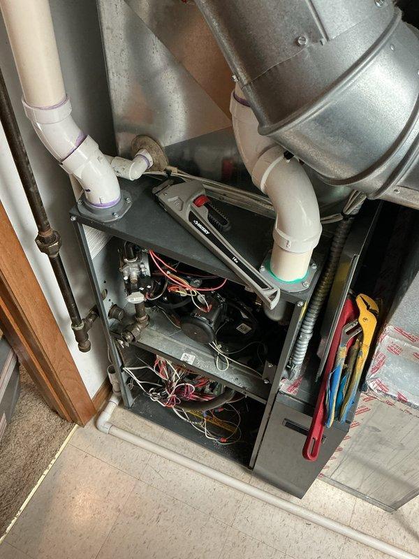 Responded to gas leak call and arrived on site to diagnose furnace issue. Upon inspection, identified gas leaking through the manifold due to a failed gas valve assembly. Removed defective gas valve and installed replacement unit. Completed warranty repair covering both parts and labor, pressure tested system for leaks, and verified proper operation before restoring unit to service.
