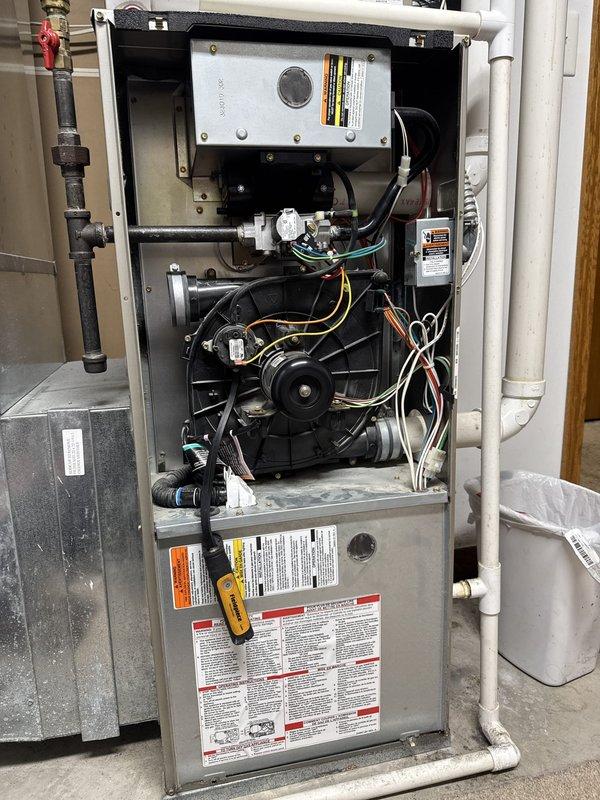 Responded to no heat complaint where furnace was cycling on briefly before shutting down. Upon inspection, discovered pressure switch hoses were clogged between the inducer motor and collector box, preventing proper operation. Cleared the clogged hoses, restored system functionality, and performed complete operational testing including combustion analysis to verify safe and efficient operation.