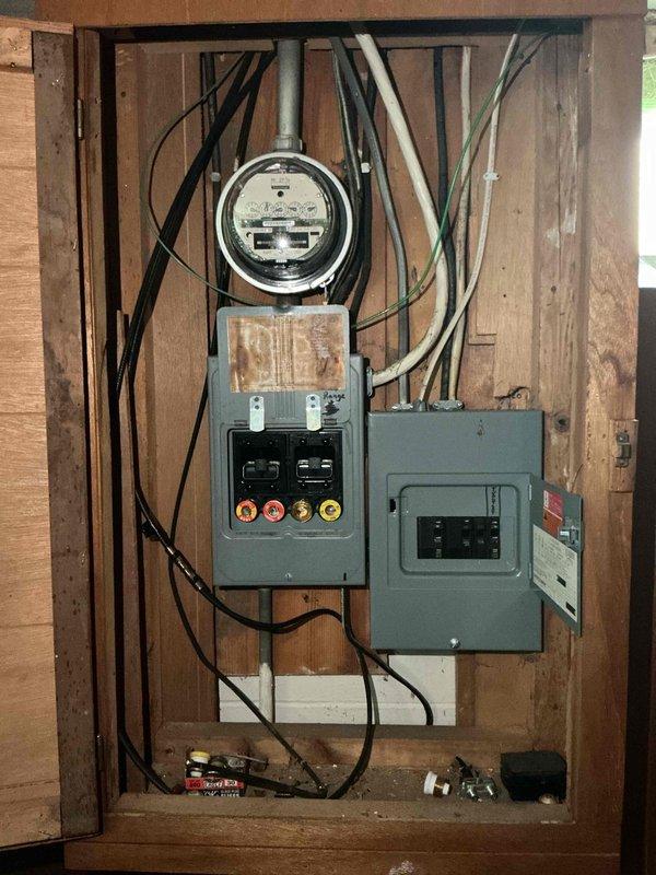 Responded to service call for intermittent power loss to stove and refrigerator. Upon inspection, identified tripping outlets caused by circuit overload at the main electrical panel. Documented existing panel configuration and advised customer that resolving the overload condition was outside the current scope of work.