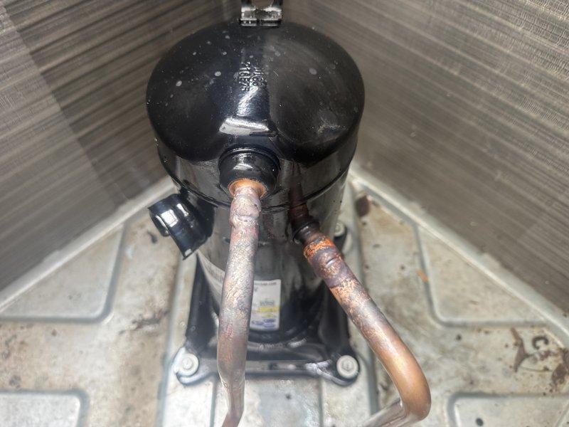 Responded to service callback and successfully completed compressor replacement on HVAC system. Removed failed compressor unit and installed new replacement compressor with proper mounting and secure refrigerant line connections. Installed new filter drier in refrigerant circuit to ensure system cleanliness and prevent contamination. All copper refrigerant lines were properly connected with appropriate fittings, and electrical connections were secured to compressor terminals. System components were installed per manufacturer specifications and industry standards. Unit tested and verified operational upon completion.