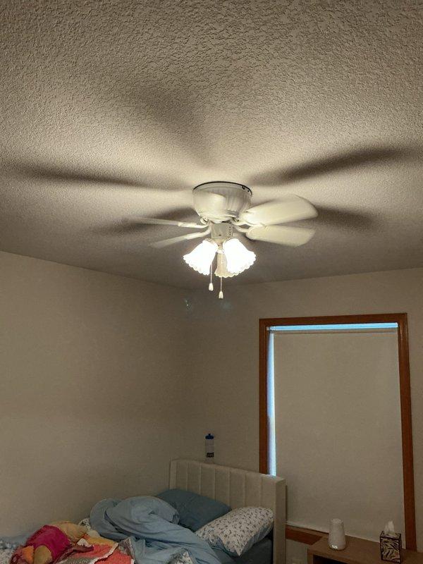 Responded to service call regarding intermittent light flickering and pulsing throughout the residence. Conducted comprehensive electrical inspection of fixtures, outlets, switches, and connections in multiple rooms including bedroom with ceiling fan light fixture. Performed thorough examination of all electrical connections, wire terminations, and circuit integrity with no loose connections, faulty wiring, or code violations identified. Verified proper operation of lighting circuits and switches, confirmed all customer-requested areas were inspected, and determined electrical system was functioning within normal parameters.