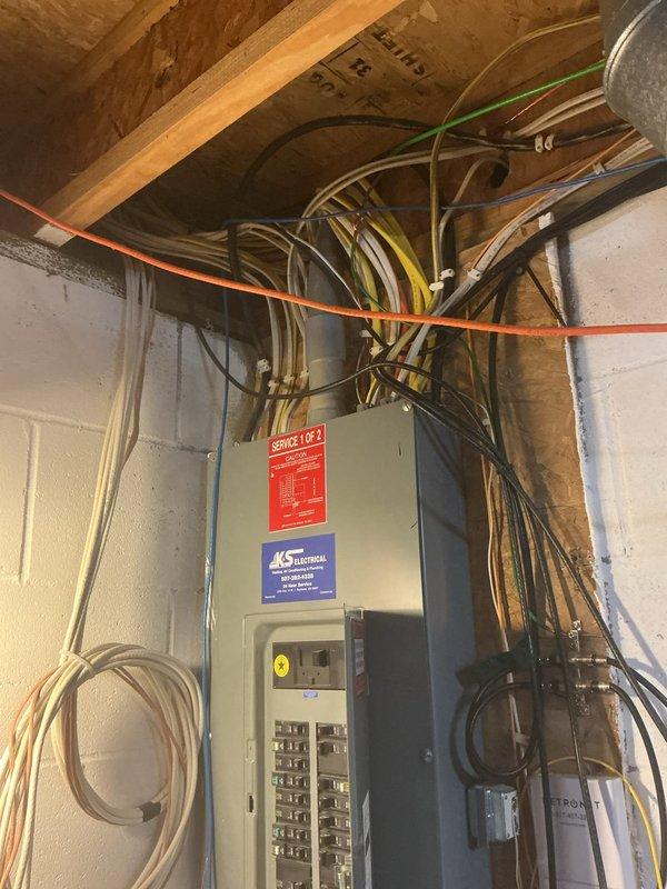 Performed on-site evaluation for electric vehicle charger installation requiring electrical service upgrade from 150 to 200 amps. Assessed existing electrical panel located in basement, which shares a common wall with the garage, providing ideal conditions for straightforward wire routing. Provided comprehensive estimate for 40-amp EV charger installation with multiple mounting location options in the garage to accommodate customer preferences and optimal charging accessibility.