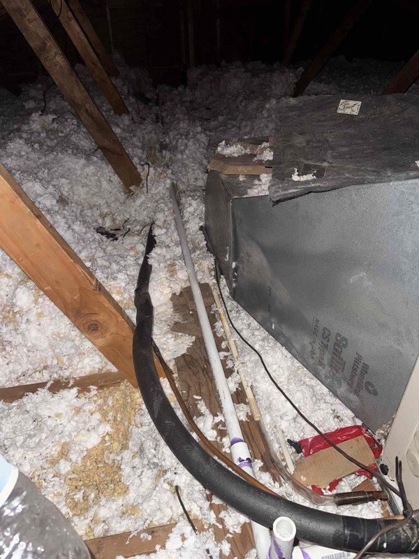 Completed follow-up service call to address attic air handler condensate drainage issue that could not be resolved during previous visit due to insufficient pitch. Successfully installed new drain line with proper slope to ensure adequate gravity drainage. Routed condensate line from attic unit through interior space and terminated at exterior wall of residence. Performed leak test by introducing water into drain pan and verified complete drainage with no leaks at connections or along pipe run. System now draining properly with appropriate pitch maintained throughout drain line installation.