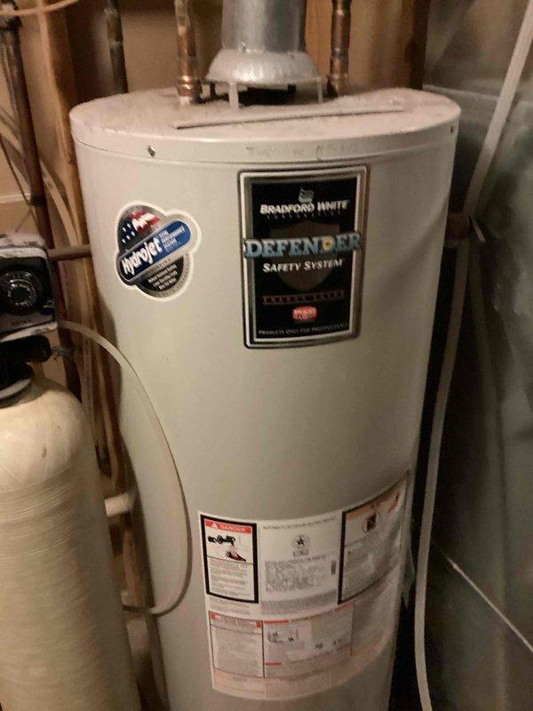 Responded to water line leak originating from shower valve in upstairs bathroom. Previous visit was unable to access leak due to mold obstruction; upon return, mold had been remediated providing clear access to plumbing system. Investigation revealed leak coming from one of two back-to-back shower valves with limited access to water lines through ceiling cavity. Accessed leak location through ceiling opening, exposing copper supply lines running through floor joists. Identified corroded copper piping with visible green patina at valve connection point as source of active leak. Documented existing conditions including water damage, compromised drywall, and plumbing configuration. Assessed repair options given challenging access constraints with back-to-back shower installations and lack of direct wall access to water lines. Provided recommendations for permanent repair solutions including potential rerouting of supply lines or creation of access panel for future serviceability.