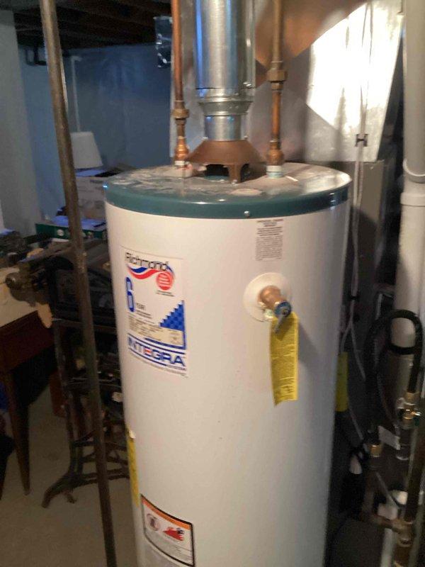 Responded to no hot water complaint and confirmed existing tanked water heater had failed and was no longer producing hot water. Performed on-site assessment of the unit and surrounding plumbing configuration in basement utility area. Provided estimate for replacement with new 40-gallon atmospheric vent natural gas water heater, including all necessary connections and venting components.