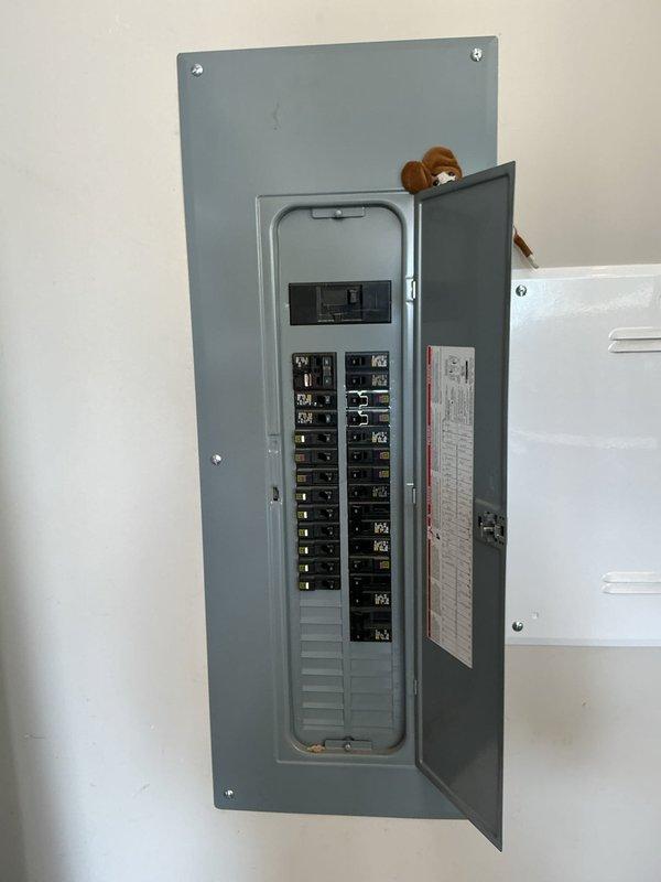 Responded to service call for refrigerator repeatedly tripping circuit breaker. Diagnosed issue as loose electrical connection at the circuit breaker panel. Tightened the affected connection, verified secure termination, and performed full panel inspection to ensure all connections were properly secured and no additional issues were present.