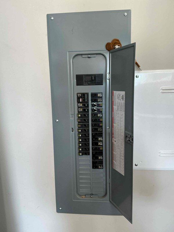 Responded to service call for refrigerator repeatedly tripping circuit breaker. Diagnosed issue as loose electrical connection at the circuit breaker panel. Tightened the affected connection, verified secure termination, and performed full panel inspection to ensure all connections were properly secured and no additional issues were present.