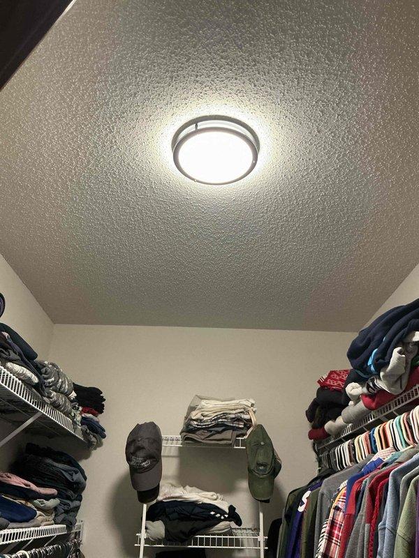 Converted electric stove outlet from 240V to 120V configuration to accommodate gas stove installation, including downsizing the receptacle and modifying circuit wiring. Installed two flush-mount LED ceiling light fixtures in closet spaces, completing all necessary electrical connections and ensuring proper illumination.