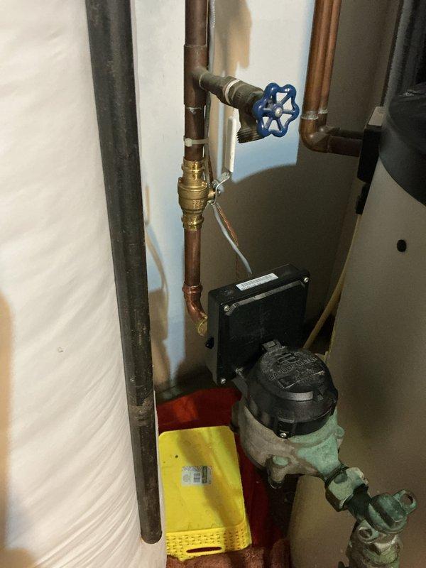 Responded to emergency call for water leak in utility room. Upon arrival, identified active leak in copper piping system near water heater and circulation pump assembly. Isolated affected section using existing shut-off valves to stop water flow. Repaired compromised pipe connection using appropriate brass fittings and secured all joints to prevent future leakage. Tested system for proper pressure and verified no additional leaks present throughout plumbing assembly before restoring water service.