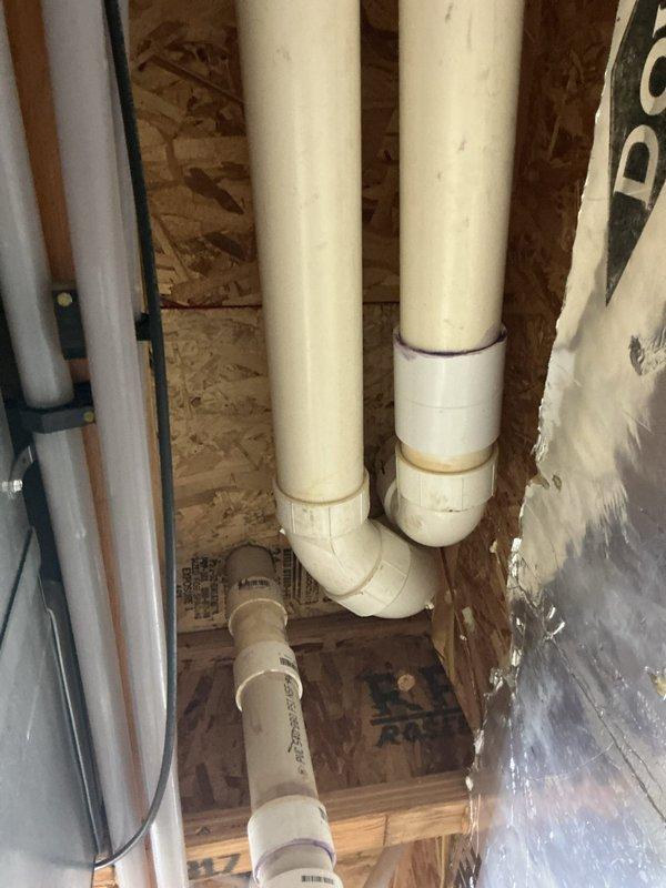 Responded to service call regarding furnace exhaust pipe freezing during winter operation. Upon inspection, determined that both the exhaust and intake PVC pipes lacked proper insulation, allowing condensation to freeze in cold weather conditions. Installed insulation on both the exhaust and intake piping to prevent future freezing issues and ensure proper system operation throughout winter months.