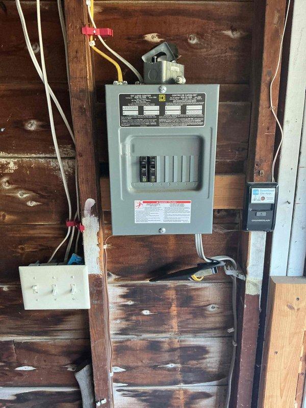 Responded to no-power condition at detached garage where main breaker was tripping even with subpanel disconnected. Diagnosed faulty breaker in main panel as root cause of power loss and tripping issue. Installed new breaker provided by customer, restoring power to garage circuit and resolving the service interruption.