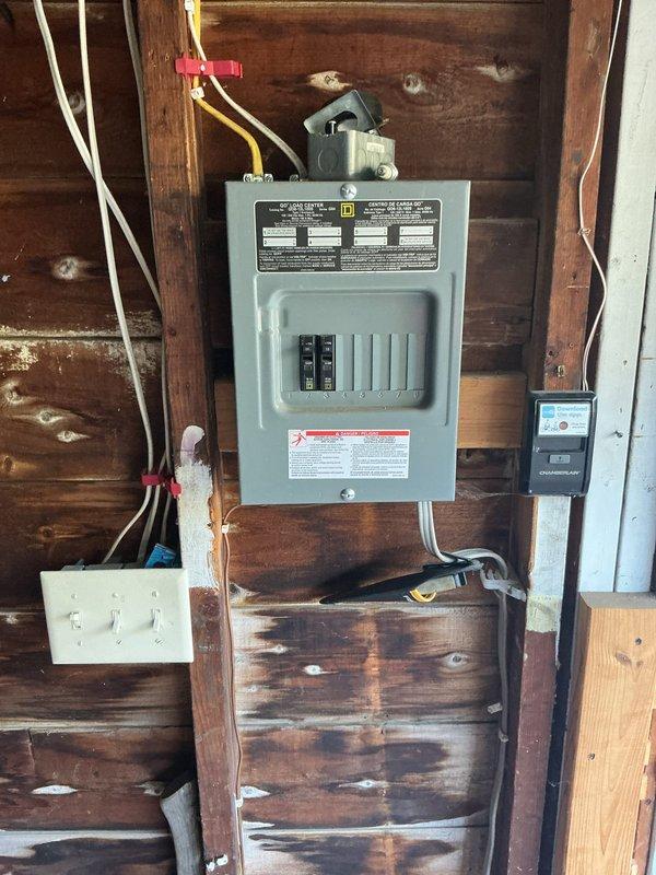 Responded to no-power condition at detached garage where main breaker was tripping even with subpanel disconnected. Diagnosed faulty breaker in main panel as root cause of power loss and tripping issue. Installed new breaker provided by customer, restoring power to garage circuit and resolving the service interruption.
