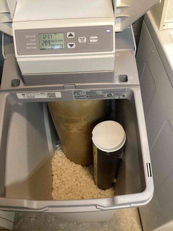 Responded to service call for water softener functionality concerns on unit installed in 1997. Performed manual regeneration cycle and conducted water hardness testing. Test results confirmed softener operating at optimal performance with hardness level measuring 3 ppm, well within acceptable parameters for properly functioning system.