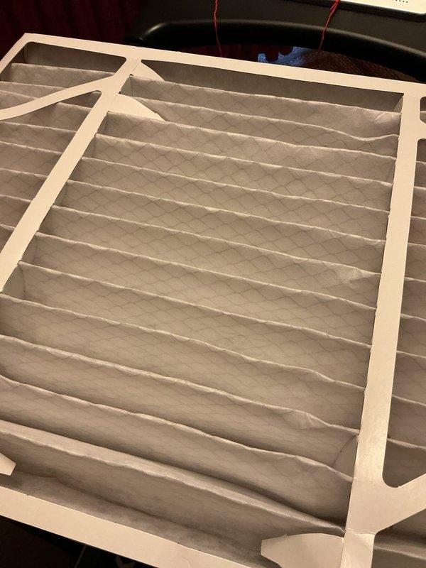 Responded to service call for routine maintenance and thermostat issue. Replaced heavily soiled air filter with new unit and installed fresh batteries in thermostat to restore proper temperature readings. System returned to normal operation upon completion.
