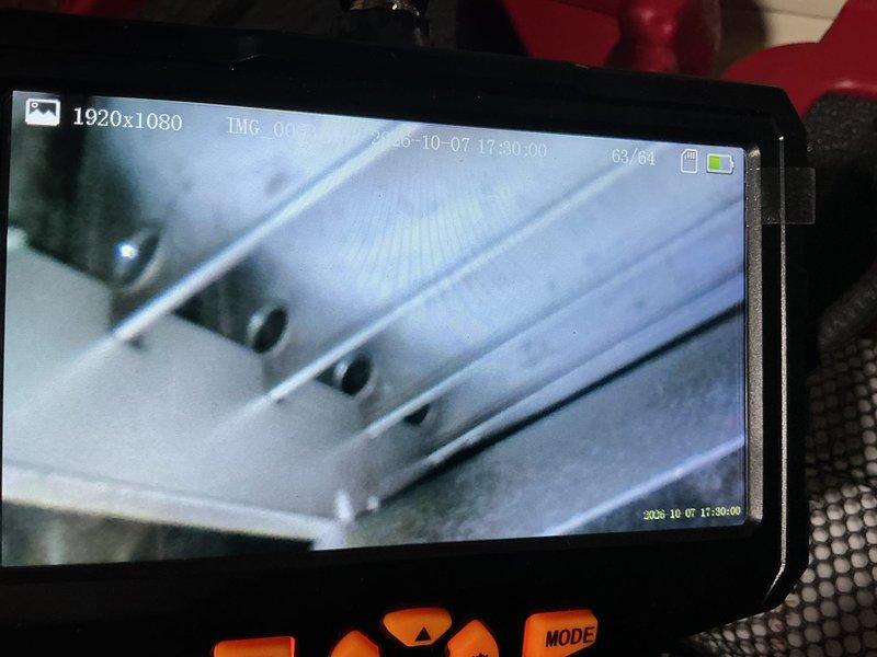 Responded to service call for aging furnace with loud operation and burning odor. Upon inspection, identified overly restrictive filter installed in 1-inch filter slot as primary cause of burning smell. Performed preventive maintenance analysis including combustion analysis testing and heat exchanger inspection using borescope camera. Replaced improper filter with correct specification filter and verified proper airflow restoration. System returned to normal operation with no further burning odor detected.