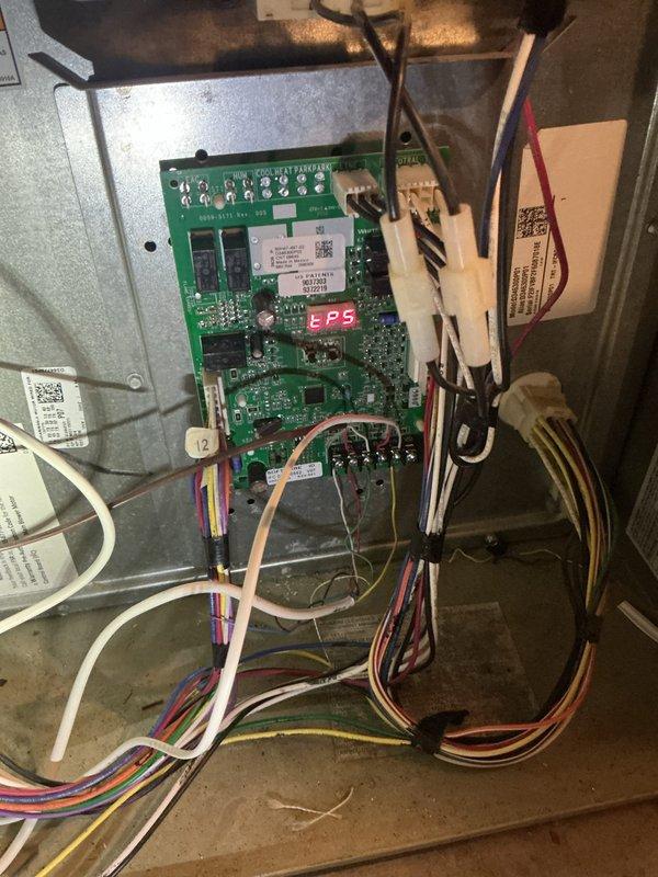 Responded to service call for HVAC system with faulty control board. Replaced defective circuit board in air handler unit with new control board from technician inventory. System was operating outside of warranty period. Verified proper operation of new circuit board, confirmed all electrical connections were secure, and tested system functionality before completing repair.