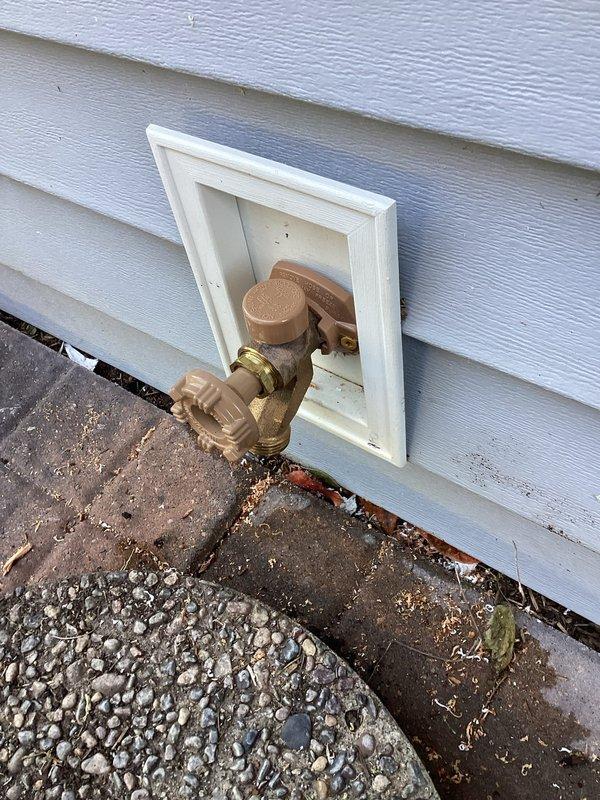Responded to a leaking outdoor hose bib that had burst and was causing water intrusion into the basement when operated. Removed the failed hose bib fixture from the exterior wall, installed a new brass hose bib with proper mounting and sealing, and tested the system under full operation to confirm proper function and verify no leakage at the fixture or connection points.