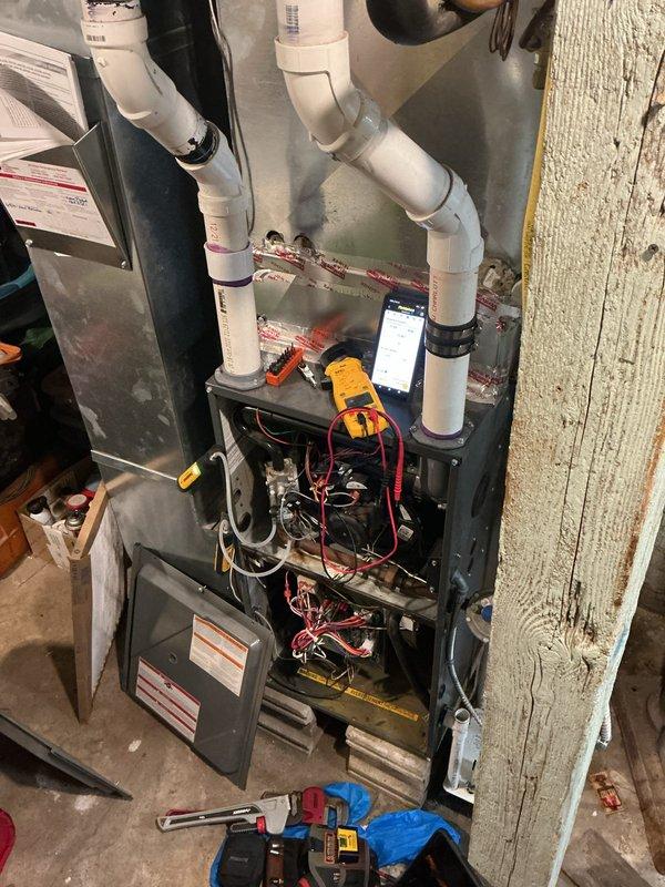 # HVAC Service - No Heat <10 years old

Responded to no heat call for furnace not turning on. Upon arrival, performed diagnostic testing to identify the source of the heating system failure. Utilized multimeter and pressure testing equipment to evaluate gas delivery and electrical components within the unit.

Diagnosis revealed a failed gas valve preventing proper fuel delivery to the burner assembly. The gas valve showed no response to electrical signals from the control board and failed to open when commanded by the thermostat. This component failure resulted in complete loss of heating capability.

Proceeded with gas valve replacement by first shutting off gas supply to the unit and verifying zero pressure at the valve. Disconnected pressure sensing tubes and electrical connections from the failed valve. Removed mounting hardware and extracted the defective gas valve from the furnace cabinet. 

Installed new gas valve assembly, ensuring proper alignment and secure mounting to manufa