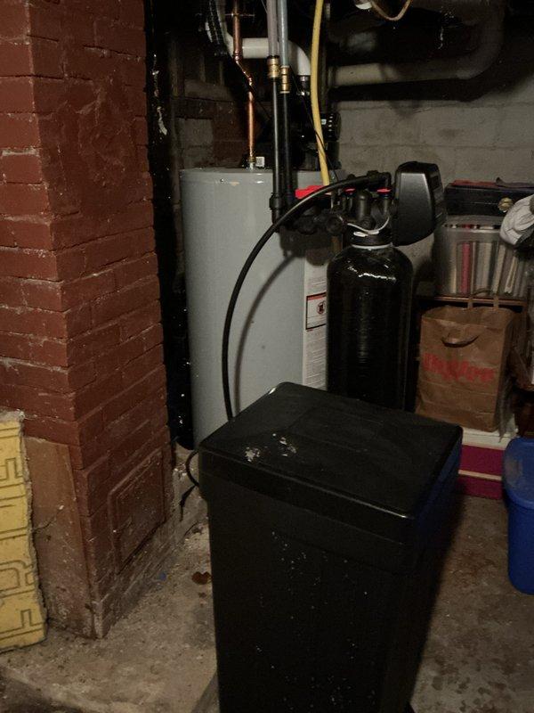 Responded to service call regarding a three-year-old water softener unit experiencing intermittent refill issues following regeneration cycles. Upon arrival, conducted comprehensive system inspection including examination of brine tank, resin tank, control valve assembly, and associated plumbing connections. Tested regeneration cycle operation and monitored fill mechanism performance. All components found functioning within normal parameters with no mechanical defects or malfunctions detected. Provided detailed operational overview to occupant, explaining proper regeneration cycle sequence, brine tank fill process, and normal system sounds during operation. System confirmed operational and left in service.