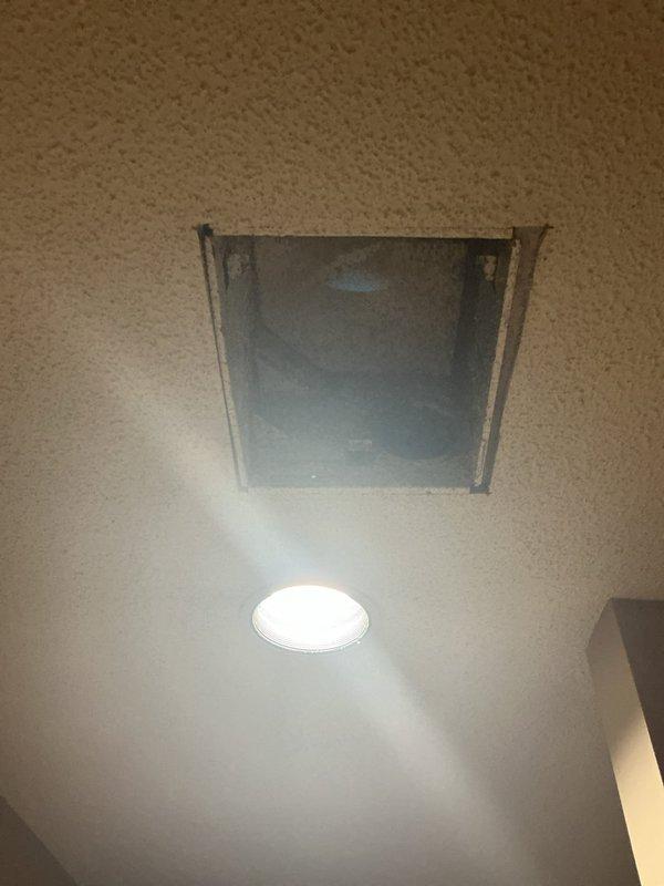 Installed customer-supplied bath fan and light combination units in both men's and women's restroom facilities. Completed ceiling access work, wiring connections, and mounting of recessed lighting fixtures with proper ventilation integration.