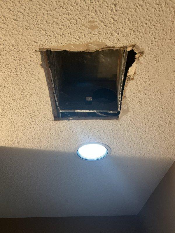 Installed customer-supplied bath fan and light combination units in both men's and women's restroom facilities. Completed ceiling access work, wiring connections, and mounting of recessed lighting fixtures with proper ventilation integration.