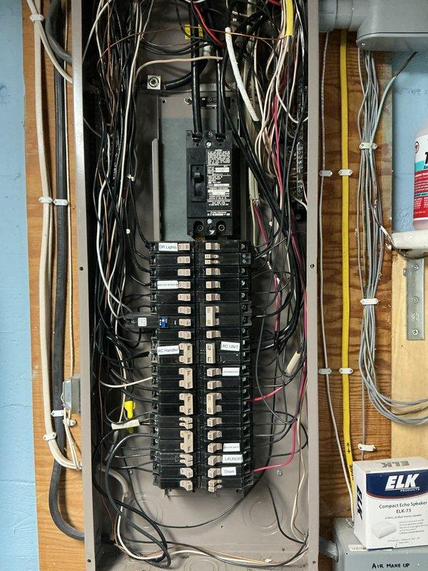 Installed AFCI breakers in residential electrical panel to provide arc fault protection for circuits containing existing knob and tube wiring to lighting fixtures. Replaced standard circuit breakers with arc fault circuit interrupters per homeowner request to enhance electrical safety in older home with legacy wiring systems. Installed surge protection device at main panel to protect household electrical equipment from voltage spikes.