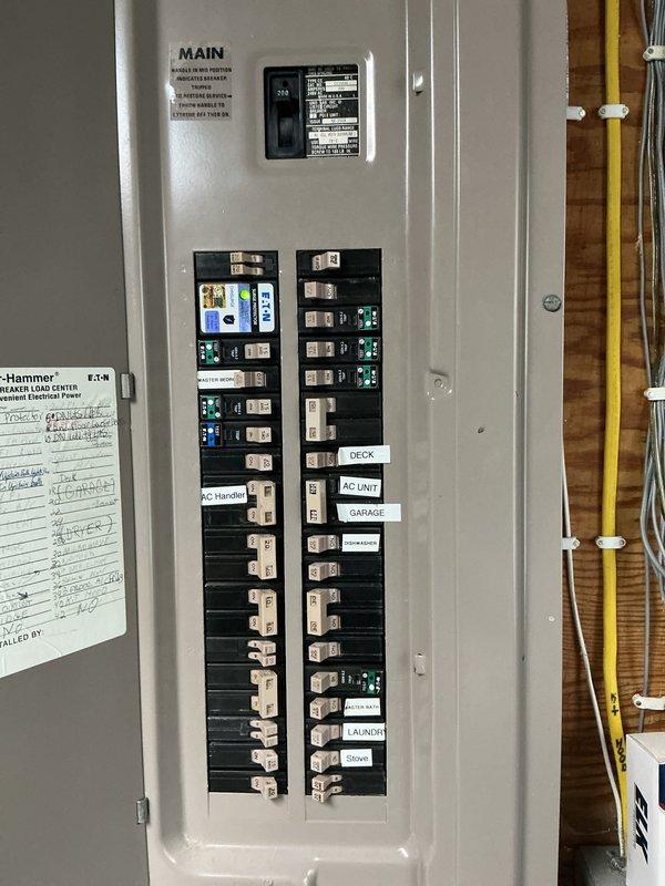 Installed AFCI breakers in residential electrical panel to provide arc fault protection for circuits containing existing knob and tube wiring to lighting fixtures. Replaced standard circuit breakers with arc fault circuit interrupters per homeowner request to enhance electrical safety in older home with legacy wiring systems. Installed surge protection device at main panel to protect household electrical equipment from voltage spikes.