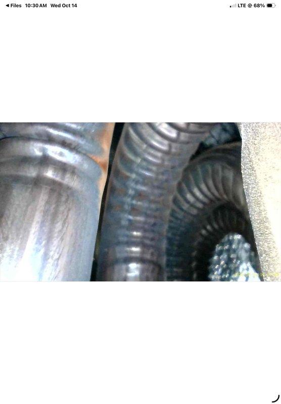 Responded to a furnace humming noise complaint, performed routine maintenance, and replaced the air filter with the correct size. Inspection camera findings revealed rust and wear on the blower wheel assembly, indicating the blower motor may need replacement.