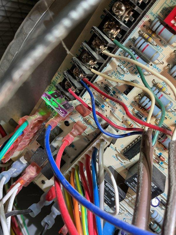 Diagnosed a no-heat condition caused by a failure to ignite, traced to a blown low-voltage control fuse and a broken wire in the furnace control circuit. Repaired the damaged wiring, replaced the blown fuse, and verified secure terminal connections on the control board to restore normal furnace operation.