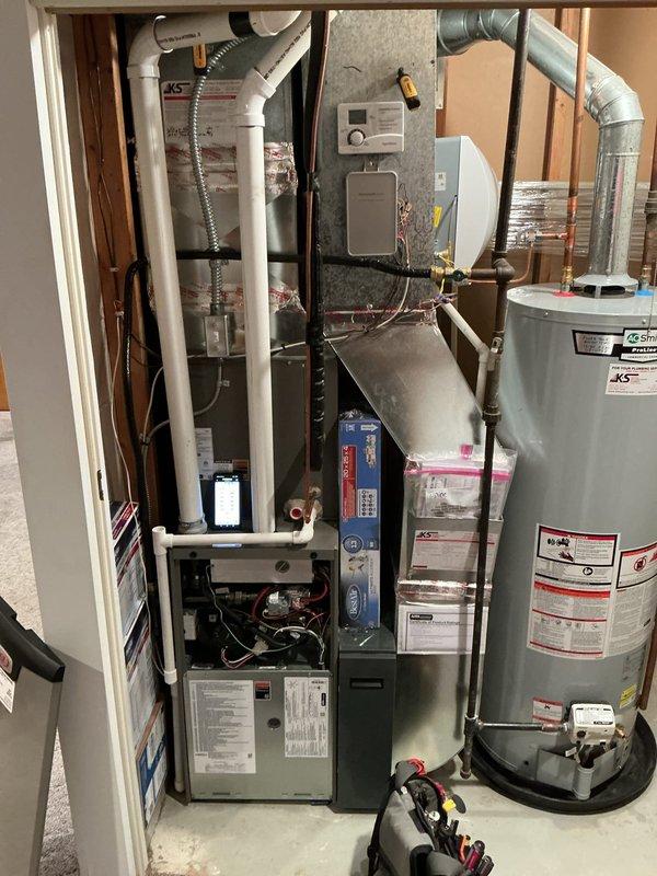 Responded to a no-heat complaint on a Lennox gas furnace displaying multiple fault codes, with a thermostat error code also present following a recent humidifier installation. Inspection of the SureLight control board identified a loose thermostat wire at the W terminal, which was interrupting the heat call. Reseated and secured the W conductor to the terminal block, restoring proper low-voltage connection and normal heating operation.