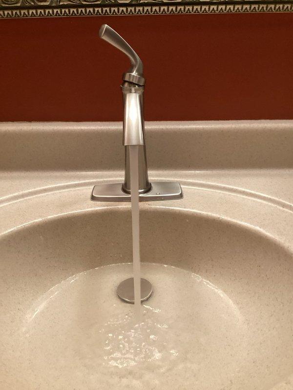 Installed a customer-supplied single-handle lavatory faucet at the basement hallway bathroom. Completed all supply connections, then ran the faucet to verify proper flow, drainage, and leak-free operation, with everything functioning as intended.