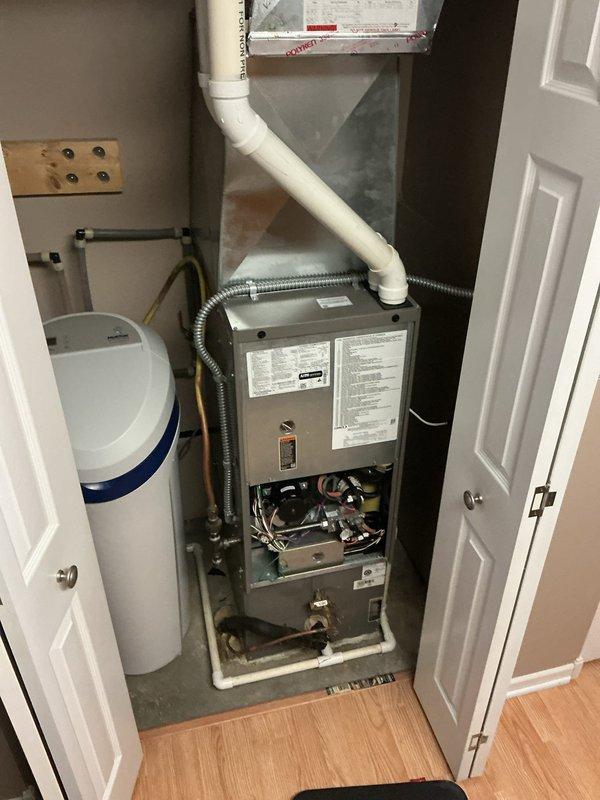 Responded to a no-heat call on a gas furnace where the blower was operating but the unit would not start a heating cycle. Diagnosed the cause as an incorrectly installed third-party thermostat and removed it, then installed the correct thermostat model and wired it to the furnace control board. Verified proper thermostat communication and normal operation, with the furnace restoring heat to the home.