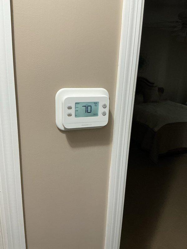 Responded to a no-heat call on a gas furnace where the blower was operating but the unit would not start a heating cycle. Diagnosed the cause as an incorrectly installed third-party thermostat and removed it, then installed the correct thermostat model and wired it to the furnace control board. Verified proper thermostat communication and normal operation, with the furnace restoring heat to the home.
