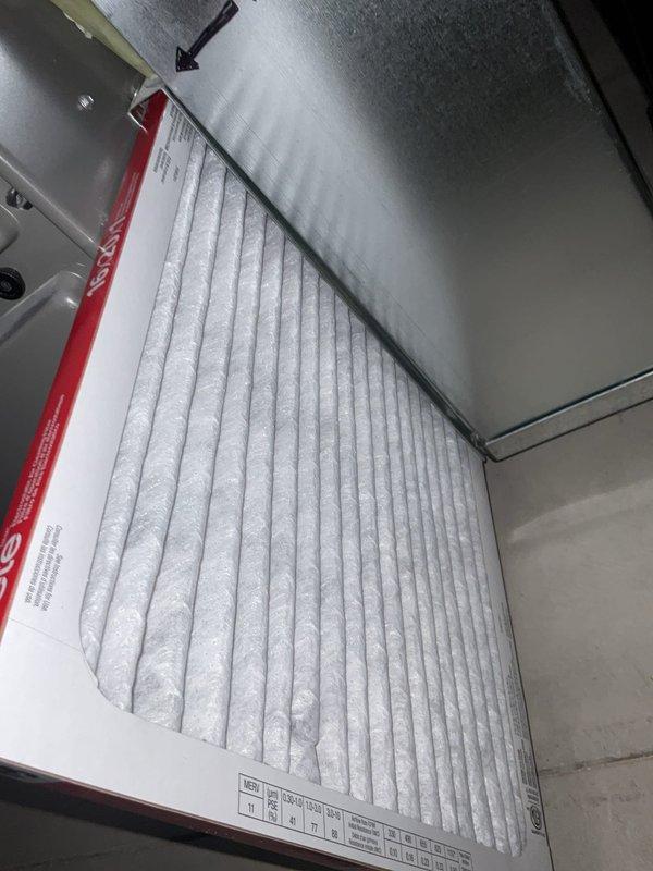 Rio, WI - Completed comprehensive preventive maintenance inspection on dual cooling systems: Lennox AC unit (2023) with evaporator coil model CX35-24B-6F-20 and Trane AC unit (2019). Inspected and documented blower wheel assembly, confirming clean operational condition with no debris accumulation or blade damage. Verified air filter installation with proper airflow direction indicated, noting clean pleated media and secure mounting within ductwork. All components operating within normal parameters with no deficiencies identified.