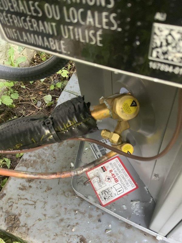 Madison, WI - Responded to after-hours recall for same-day AC and furnace installation where service valve caps were left off the outdoor unit. Inspected the condensing unit, located the valve caps at the base of the equipment, and properly secured them onto the exposed service ports to protect against contamination and environmental exposure. Documented the corrected installation with photos for quality assurance records.