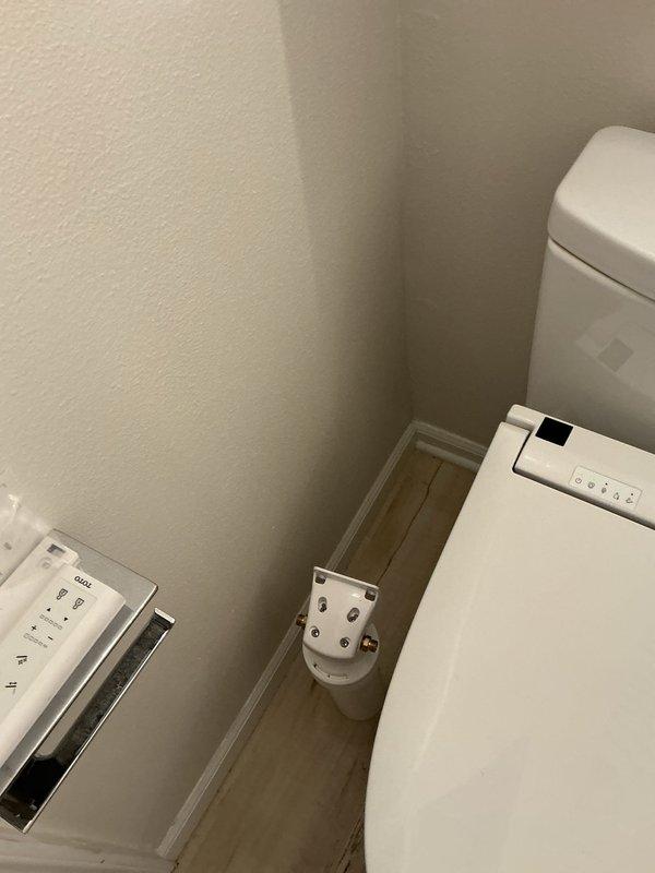 Madison, WI - Responded to service call for bidet toilet installation requiring hard water filtration system. Coordinated with customer to schedule appointment with advance notice as requested. Successfully installed hard water filter unit to existing bidet toilet system in residential bathroom. Verified proper operation of bidet control panel and filter integration. System tested and confirmed functioning correctly with no leaks or operational issues detected.