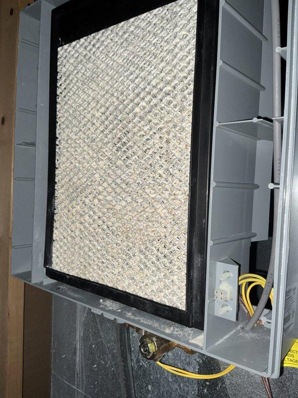 Responded to service call for water leaking underneath furnace when air conditioning system is running. Verified equipment as Allied Air furnace Model A95UH1D070B12A-01, Serial 5910M14479, installed in 2010. Inspected HVAC system and identified condensate drainage issue originating from air conditioning unit operation. Evaluated condensate drain line, drain pan, and associated components for blockages or improper drainage. Observed heavily soiled air filter with significant dust and debris accumulation, which can restrict airflow and contribute to condensate overflow conditions. Documented electrical panel configuration and system components. Collected air conditioning equipment information for account records. Provided diagnostic assessment of condensate management system and recommended corrective actions to resolve water leakage issue.