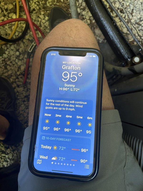 Responded to cooling complaint on dual Rheem RA1642AJ1NA air conditioning systems installed in 2021. Customer reported thermostat set at 71°F but house temperature at 73°F with air feeling cool but not sufficiently cold during 95°F ambient conditions. Performed diagnostic testing using manifold gauges and temperature measurements, recording supply air temperature of 56°F at the registers. Verified system operation, checked refrigerant pressures, and assessed overall performance of both units during extreme heat conditions.