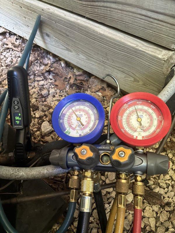 Responded to cooling complaint on dual Rheem RA1642AJ1NA air conditioning systems installed in 2021. Customer reported thermostat set at 71°F but house temperature at 73°F with air feeling cool but not sufficiently cold during 95°F ambient conditions. Performed diagnostic testing using manifold gauges and temperature measurements, recording supply air temperature of 56°F at the registers. Verified system operation, checked refrigerant pressures, and assessed overall performance of both units during extreme heat conditions.