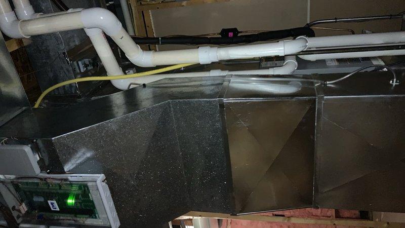 Completed full multi-zone HVAC system installation consisting of two separate systems serving different areas of the residence. Primary system installed to service main level and basement, including Armstrong Air A97UH2E110C20SK-01 gas furnace (Serial: 5926E16844), Armstrong Air A7AC13F48P-04A air conditioner (Serial: 1625J08671), 7EC48CX-71 indoor coil (Serial: 1525D53551), Aprilaire 720M humidifier (Serial: *02260300543----720M--*), Elite Pro White thermostat model 1210, and associated ductwork and refrigerant lines. Secondary furnace-only system installed in closet location to service master bedroom, second floor bedrooms, and sport court area, consisting of Armstrong Air A97UH2E070 gas furnace, Elite Pro White thermostat model 1210, and Aprilaire 720M humidifier with complete duct distribution. All equipment positioned, leveled, and secured per manufacturer specifications. Refrigerant lines brazed, pressure tested, evacuated, and charged to factory specifications for cooling system