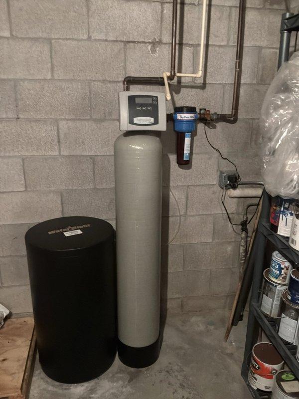 Completed comprehensive cooling system maintenance check on two HVAC systems including a 1987 Lennox HS16-411V-4P condensing unit (38 years old) and a 2006 Carrier 58UVB060-F-10114 furnace (19 years old). Performed full multi-point inspection on both systems, verified equipment operation, checked refrigerant levels, inspected electrical connections and controls, examined ductwork and airflow, and documented system conditions with photographic records. Both systems found operational with primary and secondary heat exchangers under active manufacturer warranty through 2047.