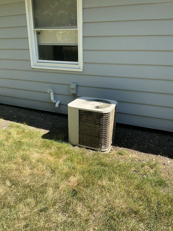 Completed equipment assessment and provided replacement estimate for 37-year-old HVAC system including Carrier 398AAW036060D furnace (serial 4988A04593) and Payne 591ANX024000AAAA air conditioner (serial 0489E32475) with non-operational cooling function. Verified equipment specifications, documented existing installation configuration including exterior condenser unit placement, electrical disconnect, and condensate drainage system.