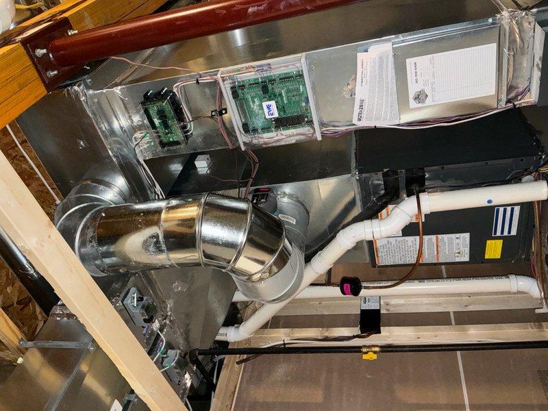 Completed comprehensive member check-up on single HVAC system including 2025 Daikin condenser, 10-year-old York gas furnace (Model TG9S080B12MP11B), and 10-year-old Bradford White water heater (Model RG2PV50T6N). Performed full system inspection of attic-mounted air handler unit, verified proper operation of control boards and electronic components, checked condensate drainage lines, inspected ductwork connections and seals, and confirmed thermostat functionality with digital interface displaying proper temperature readings at 68 degrees. All equipment verified operational with no deficiencies noted; system running within normal parameters.