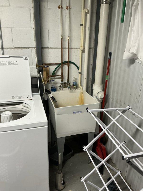 Conducted comprehensive evaluation of existing HVAC system for AC replacement and equipment relocation. Documented gas and electric meters for Focus on Energy rebate eligibility. Inspected basement-mounted natural gas furnace and ground-level air conditioning unit, photographing existing equipment conditions including internal wiring, refrigerant connections, and mechanical components. Assessed utility room layout and existing plumbing infrastructure to determine feasibility for proposed equipment relocation and replacement project.